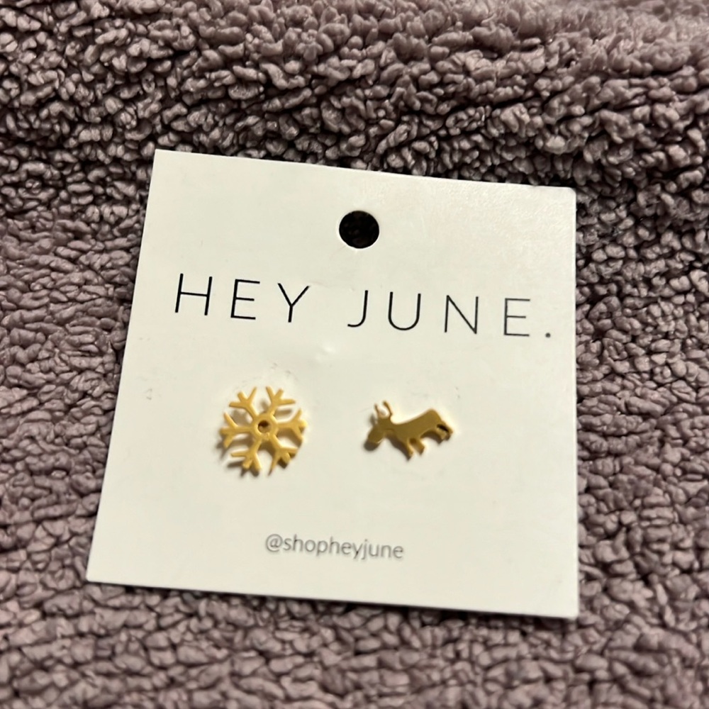 Hey June gold snowflake and reindeer earrings